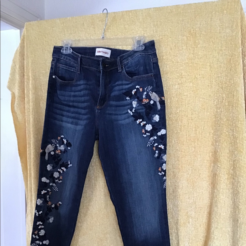 Embroidered jeans.